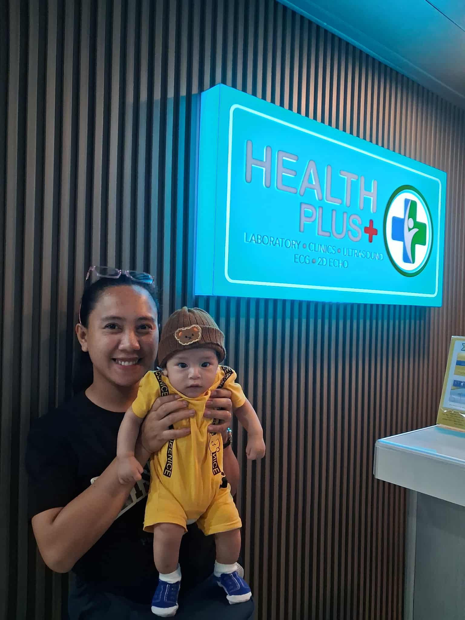 Mom and baby at Health Plus clinic